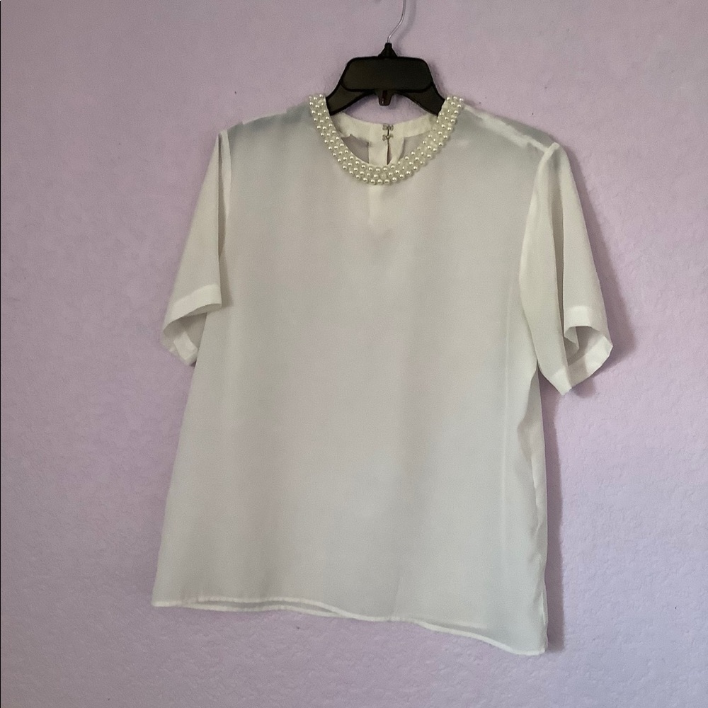 White Blouse with Peal detail at the neckline